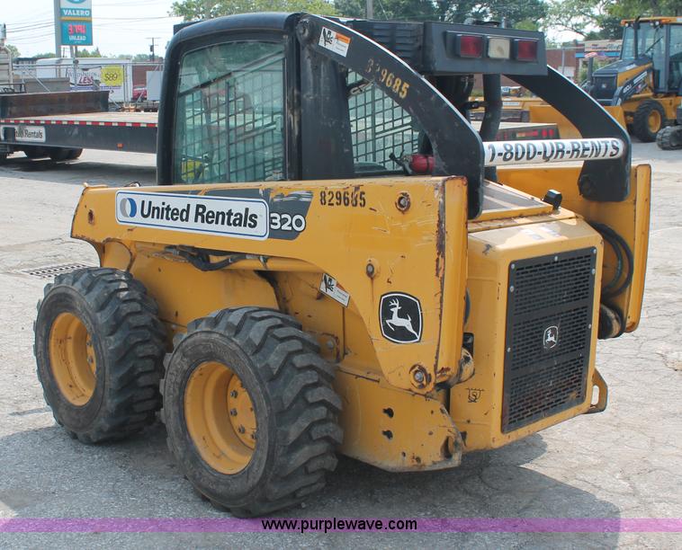 image for item C2798 2006 John Deere 320 skid steer
