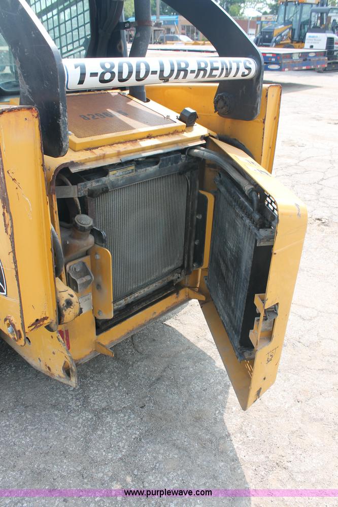 image for item C2798 2006 John Deere 320 skid steer