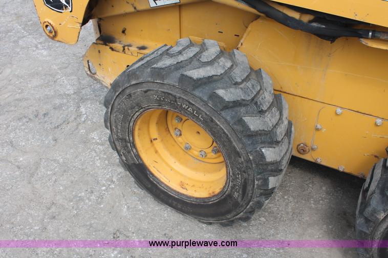image for item C2798 2006 John Deere 320 skid steer