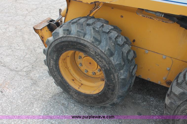 image for item C2798 2006 John Deere 320 skid steer