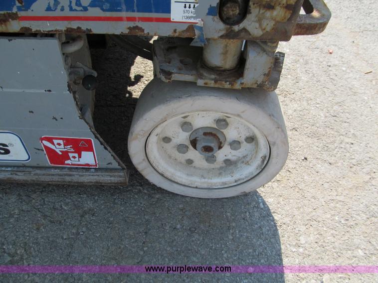 image for item E2084 2006 Skyjack SJ-III 3219 electric scissor lift