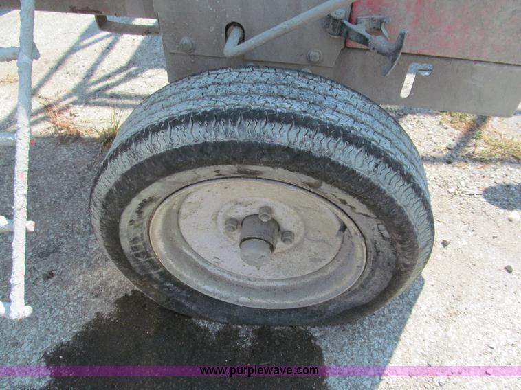 image for item E2092 2009 Multiquip WM90 gas powered towable mortar mixer
