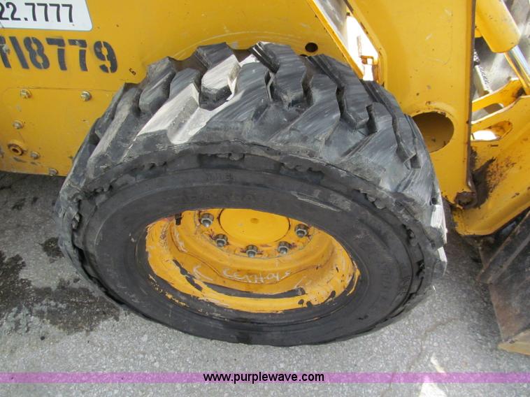 image for item E2128 2007 John Deere 317 skid steer