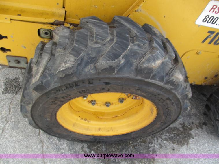 image for item E2128 2007 John Deere 317 skid steer