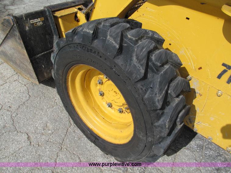 image for item E2128 2007 John Deere 317 skid steer
