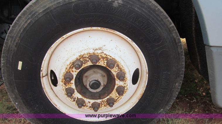 image for item F3018 1994 Freightliner FLD112 semi truck