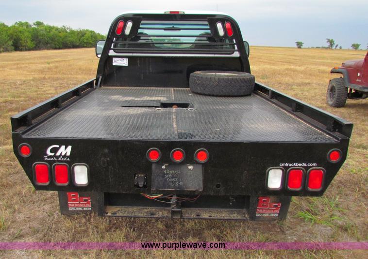 image for item B7474 2003 Ford F350 XL Super Duty flatbed pickup truck