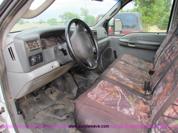 image for item B7474 2003 Ford F350 XL Super Duty flatbed pickup truck