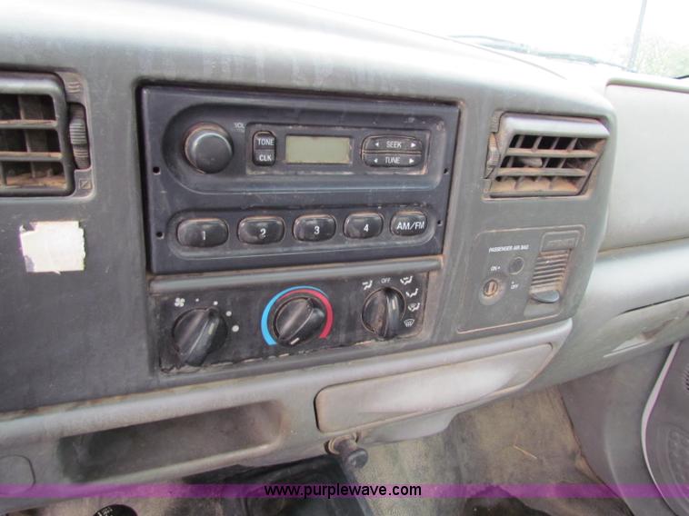 image for item B7474 2003 Ford F350 XL Super Duty flatbed pickup truck