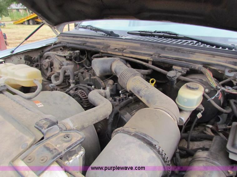 image for item B7474 2003 Ford F350 XL Super Duty flatbed pickup truck