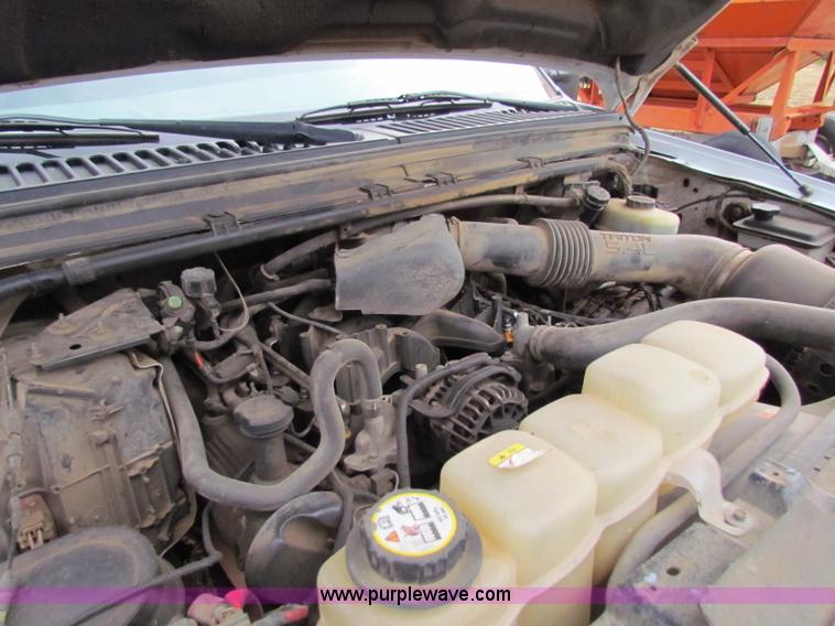 image for item B7474 2003 Ford F350 XL Super Duty flatbed pickup truck