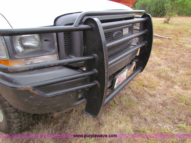 image for item B7474 2003 Ford F350 XL Super Duty flatbed pickup truck