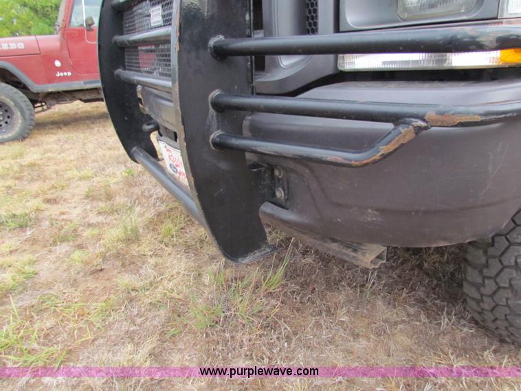 image for item B7474 2003 Ford F350 XL Super Duty flatbed pickup truck