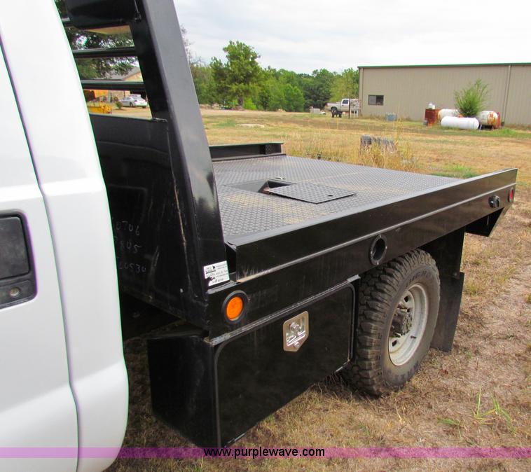 image for item B7474 2003 Ford F350 XL Super Duty flatbed pickup truck