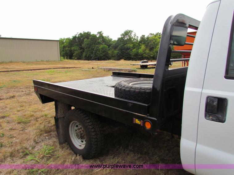 image for item B7474 2003 Ford F350 XL Super Duty flatbed pickup truck