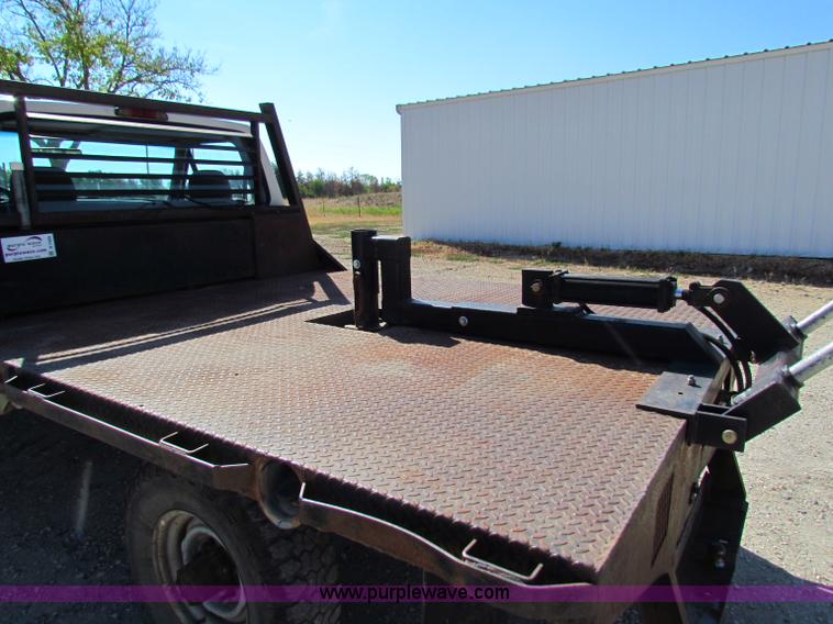 image for item B7489 1995 Ford F250 XL flatbed pickup truck