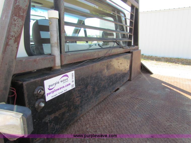 image for item B7489 1995 Ford F250 XL flatbed pickup truck