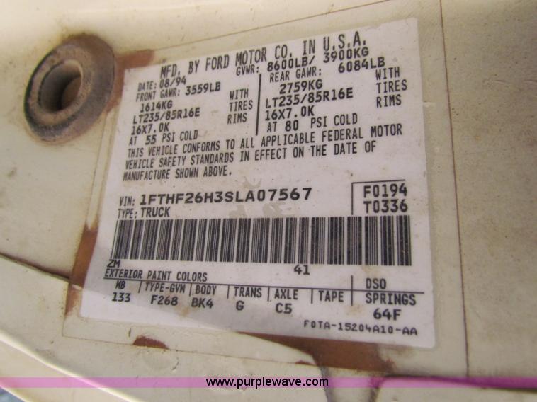 image for item B7489 1995 Ford F250 XL flatbed pickup truck