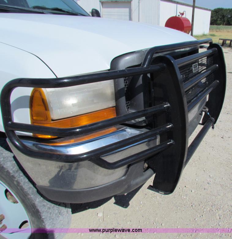 image for item B7490 2000 Ford F550 XL Super Duty flatbed pickup truck