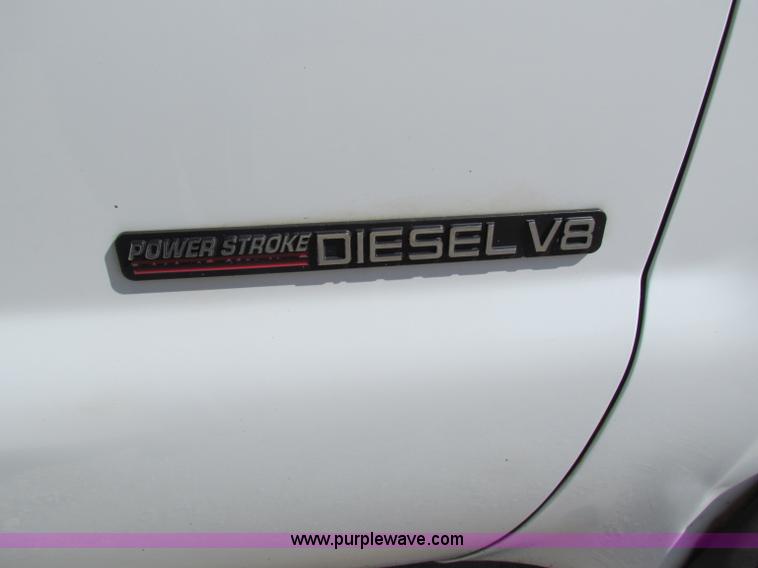 image for item B7490 2000 Ford F550 XL Super Duty flatbed pickup truck