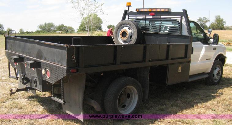 image for item B8057 2000 Ford F450 XL Super Duty flatbed pickup truck