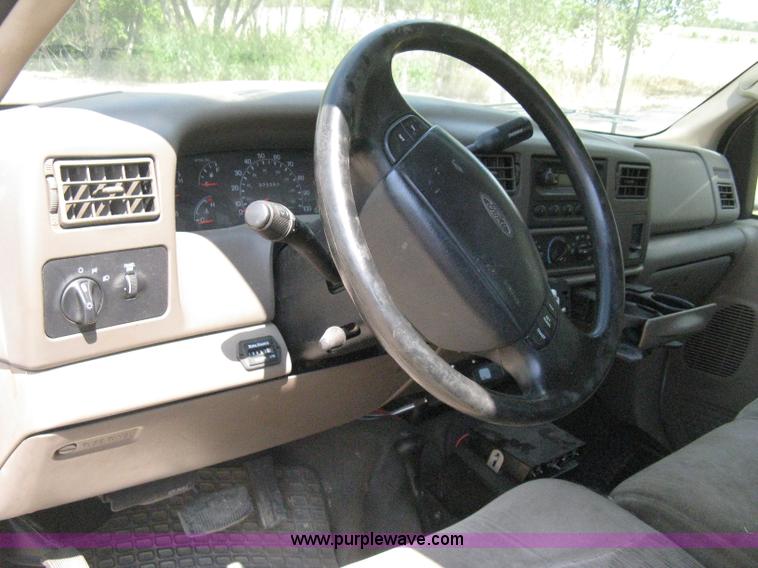 image for item B8057 2000 Ford F450 XL Super Duty flatbed pickup truck