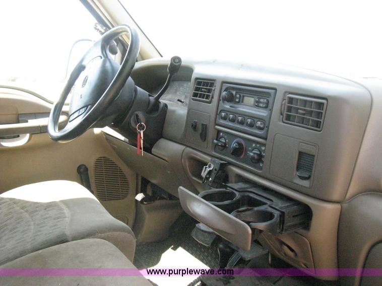 image for item B8057 2000 Ford F450 XL Super Duty flatbed pickup truck