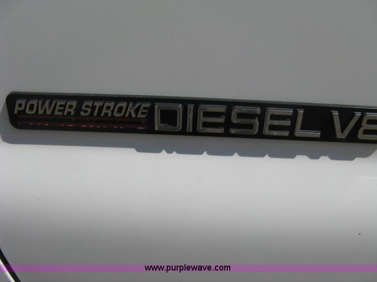 image for item B8057 2000 Ford F450 XL Super Duty flatbed pickup truck