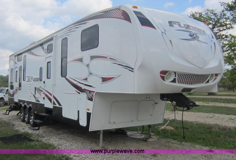 image for item C5426 2011 Keystone Fuzion toy hauler travel trailer