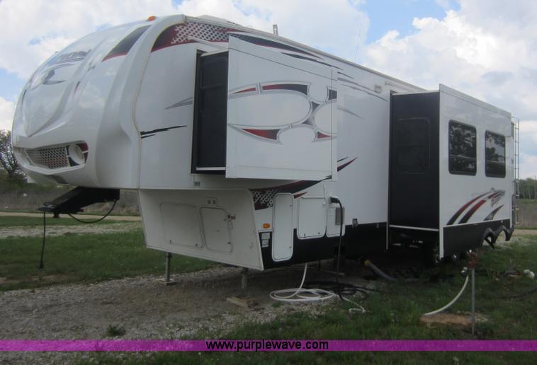 image for item C5426 2011 Keystone Fuzion toy hauler travel trailer