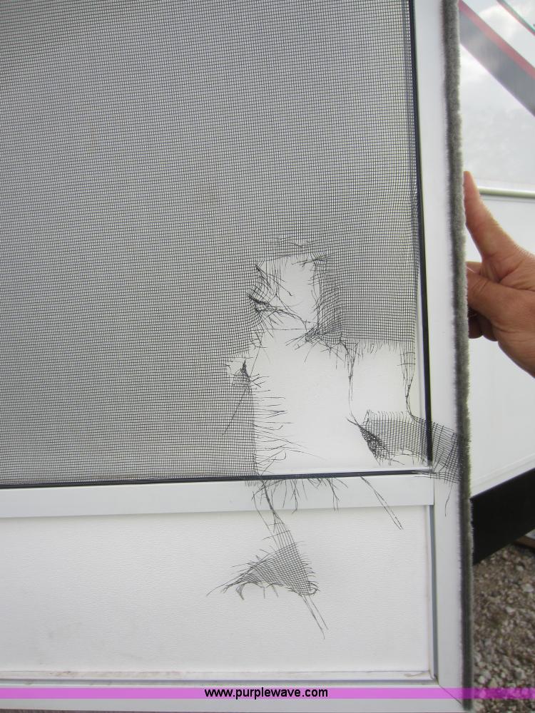 image for item C5426 2011 Keystone Fuzion toy hauler travel trailer