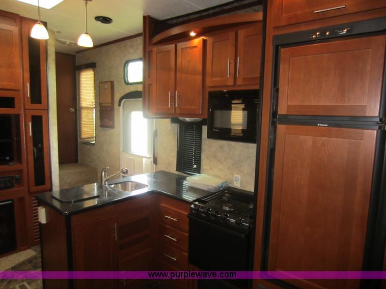 image for item C5426 2011 Keystone Fuzion toy hauler travel trailer