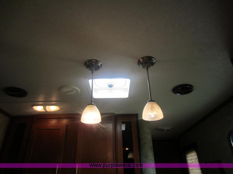 image for item C5426 2011 Keystone Fuzion toy hauler travel trailer