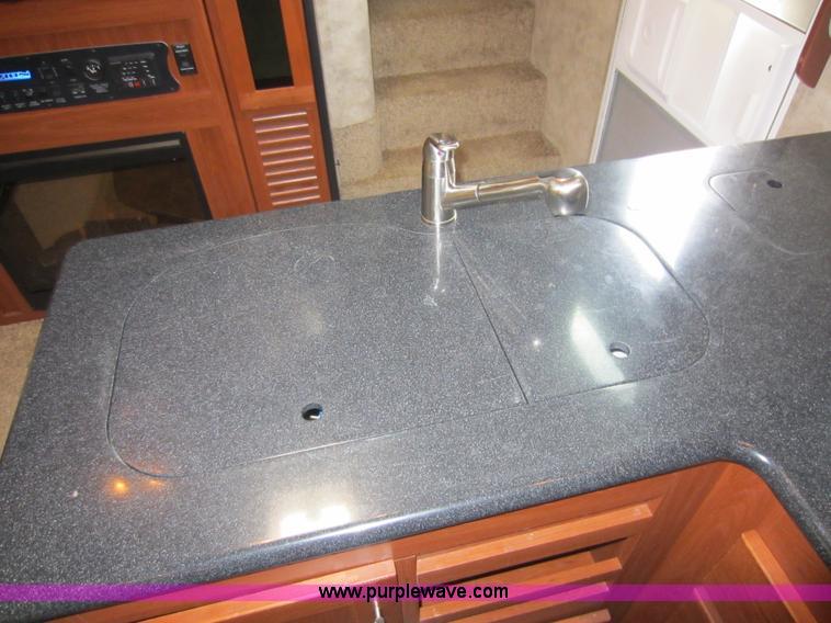 image for item C5426 2011 Keystone Fuzion toy hauler travel trailer