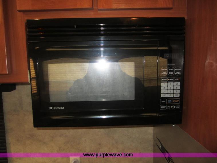 image for item C5426 2011 Keystone Fuzion toy hauler travel trailer