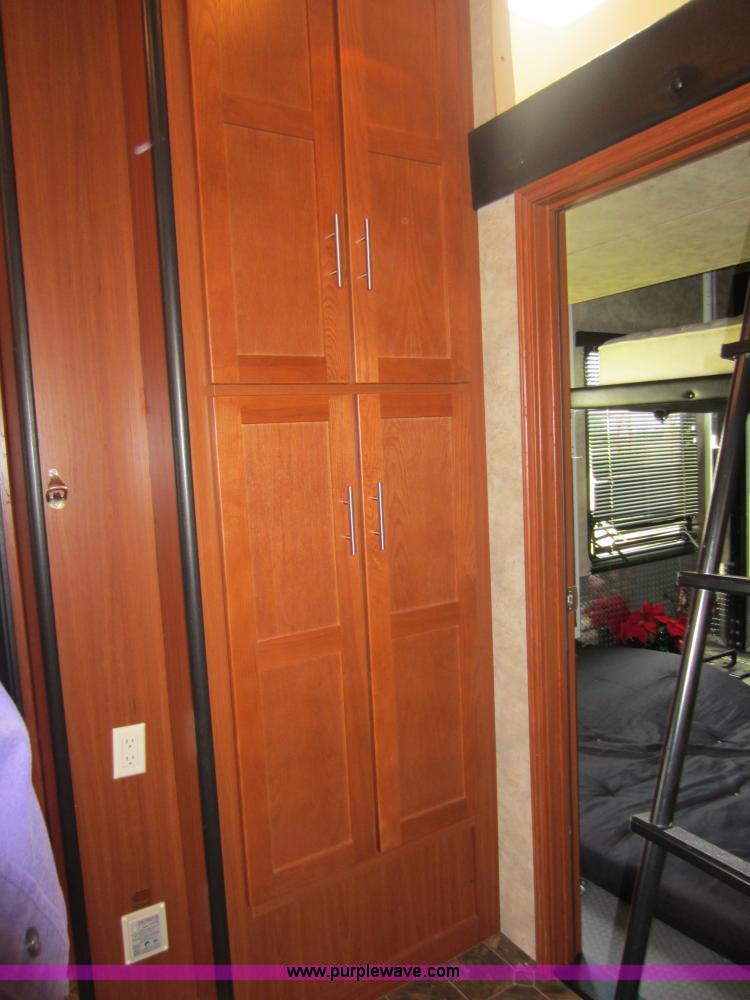 image for item C5426 2011 Keystone Fuzion toy hauler travel trailer