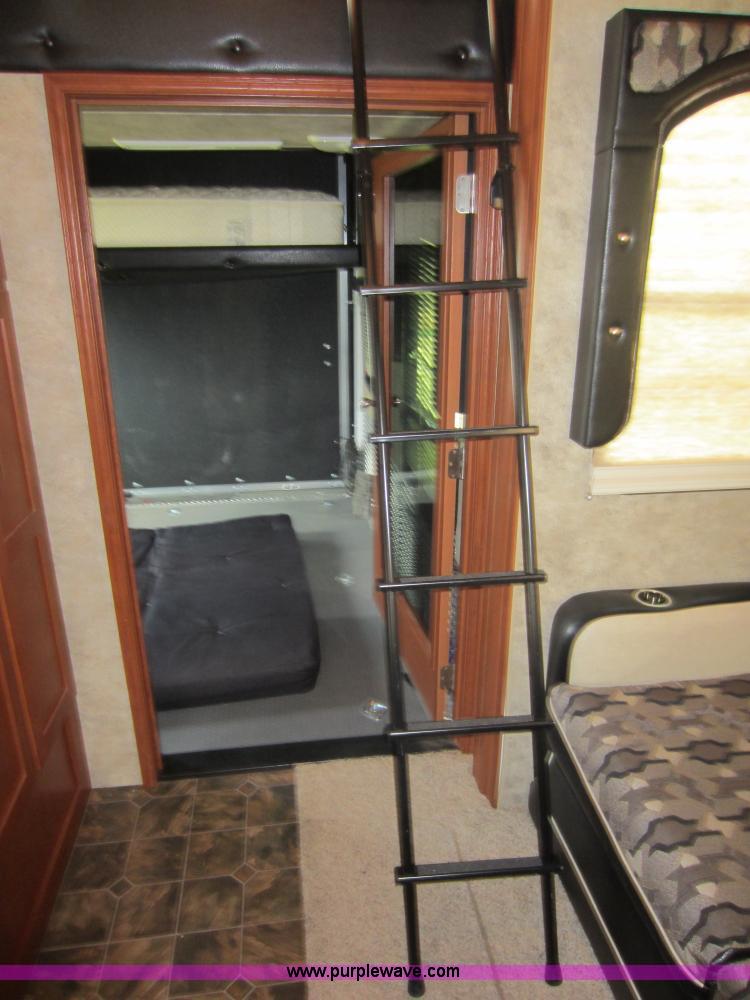 image for item C5426 2011 Keystone Fuzion toy hauler travel trailer