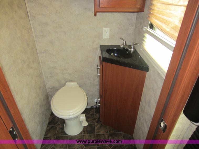 image for item C5426 2011 Keystone Fuzion toy hauler travel trailer