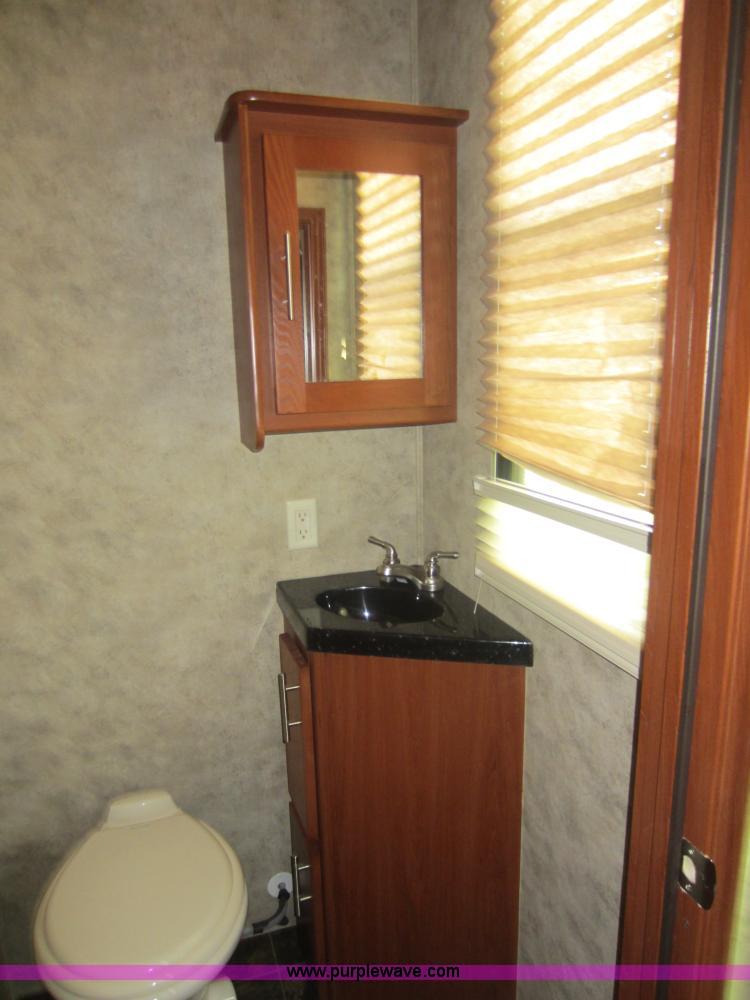 image for item C5426 2011 Keystone Fuzion toy hauler travel trailer