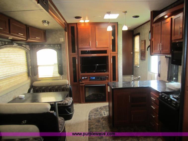 image for item C5426 2011 Keystone Fuzion toy hauler travel trailer