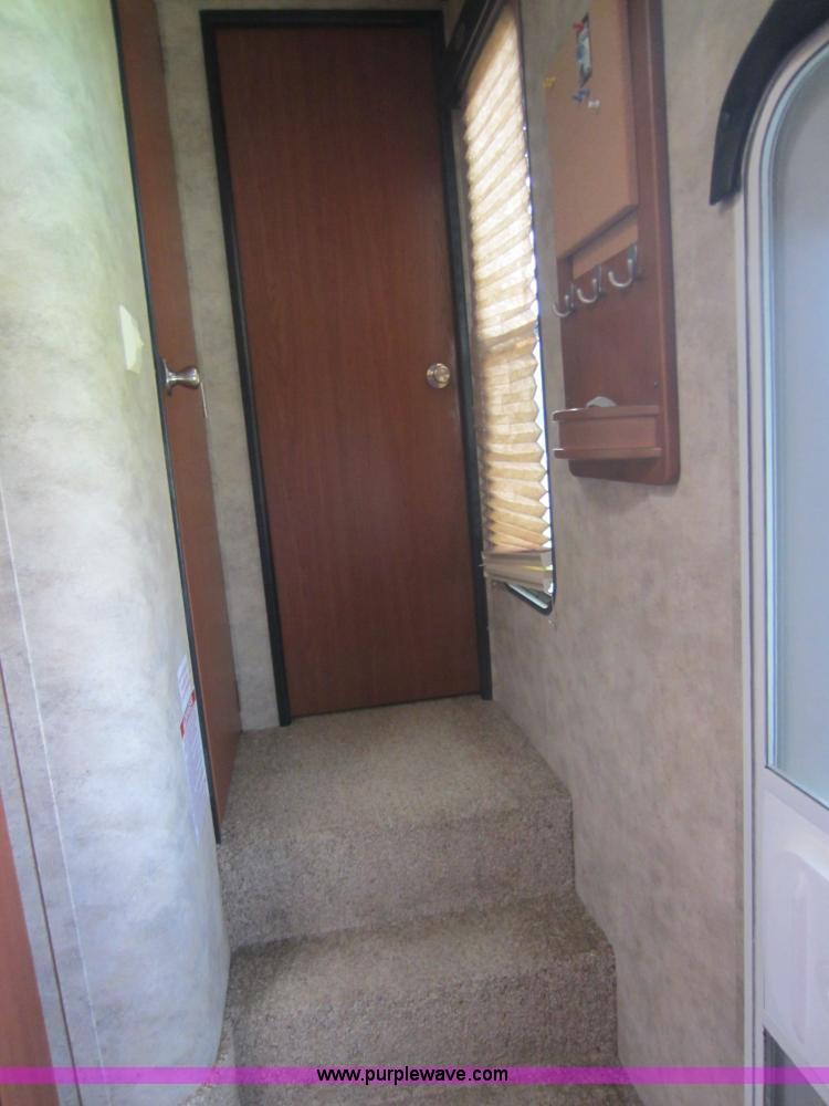 image for item C5426 2011 Keystone Fuzion toy hauler travel trailer