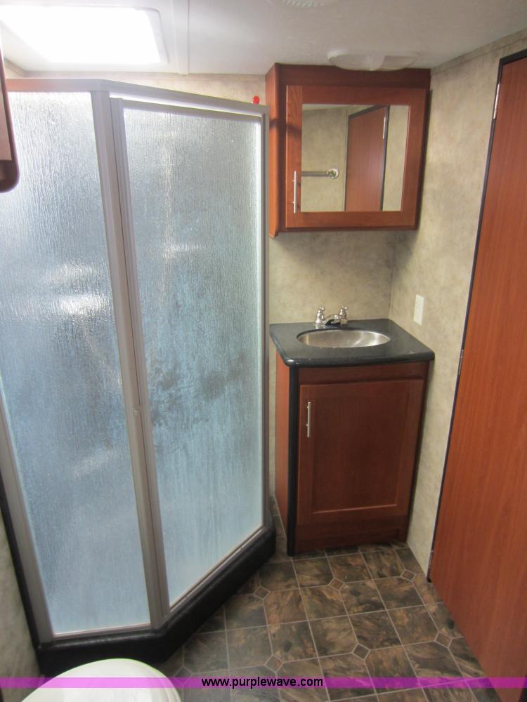 image for item C5426 2011 Keystone Fuzion toy hauler travel trailer