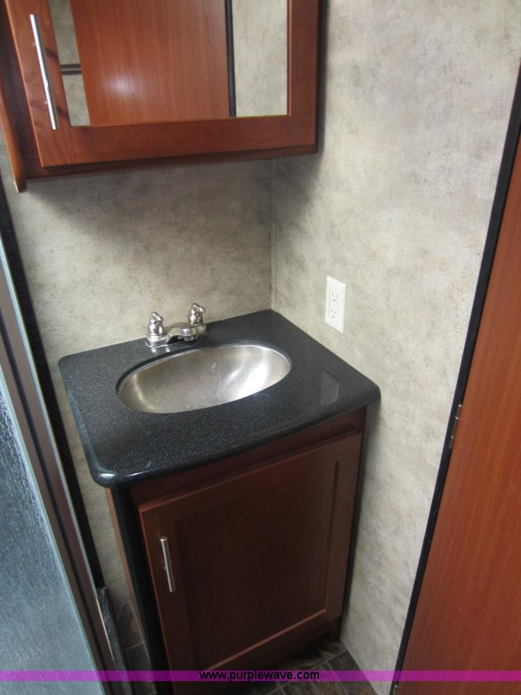 image for item C5426 2011 Keystone Fuzion toy hauler travel trailer