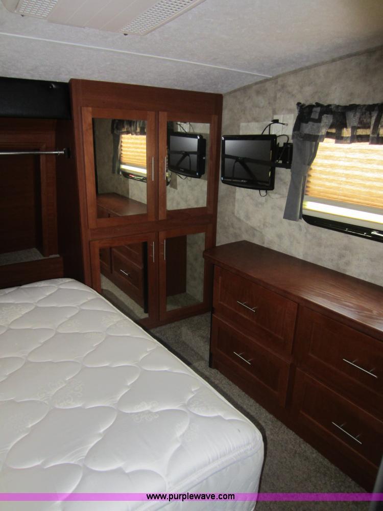 image for item C5426 2011 Keystone Fuzion toy hauler travel trailer