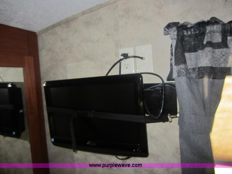 image for item C5426 2011 Keystone Fuzion toy hauler travel trailer