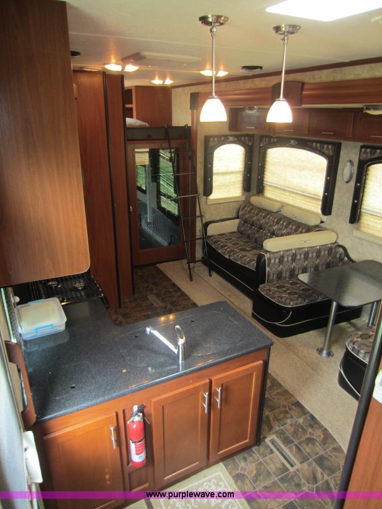 image for item C5426 2011 Keystone Fuzion toy hauler travel trailer