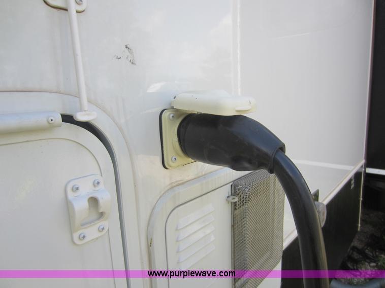 image for item C5426 2011 Keystone Fuzion toy hauler travel trailer