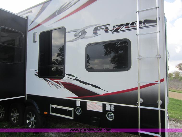 image for item C5426 2011 Keystone Fuzion toy hauler travel trailer