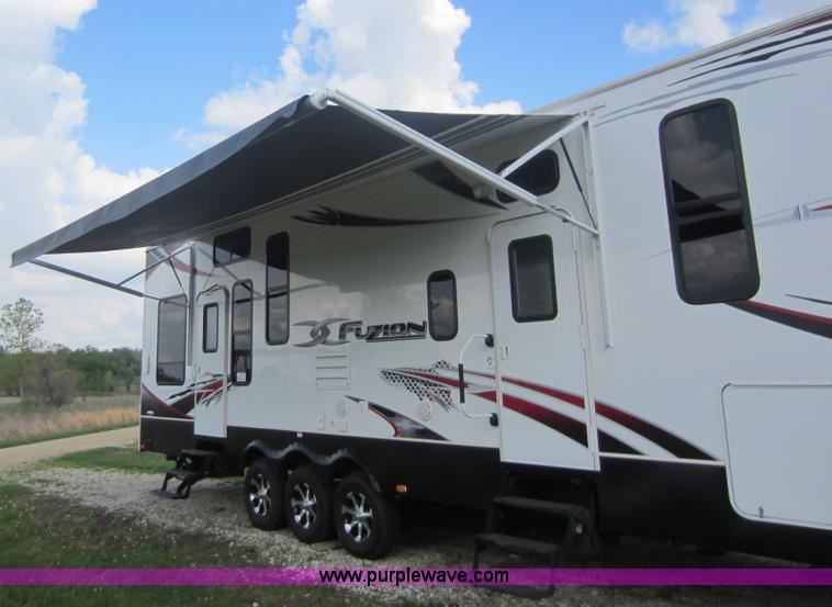 image for item C5426 2011 Keystone Fuzion toy hauler travel trailer