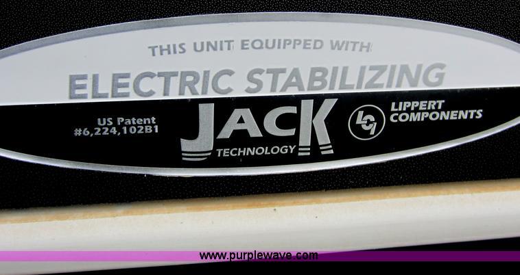 image for item C5426 2011 Keystone Fuzion toy hauler travel trailer